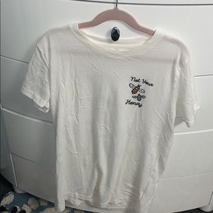 white short sleeve shirt with bee